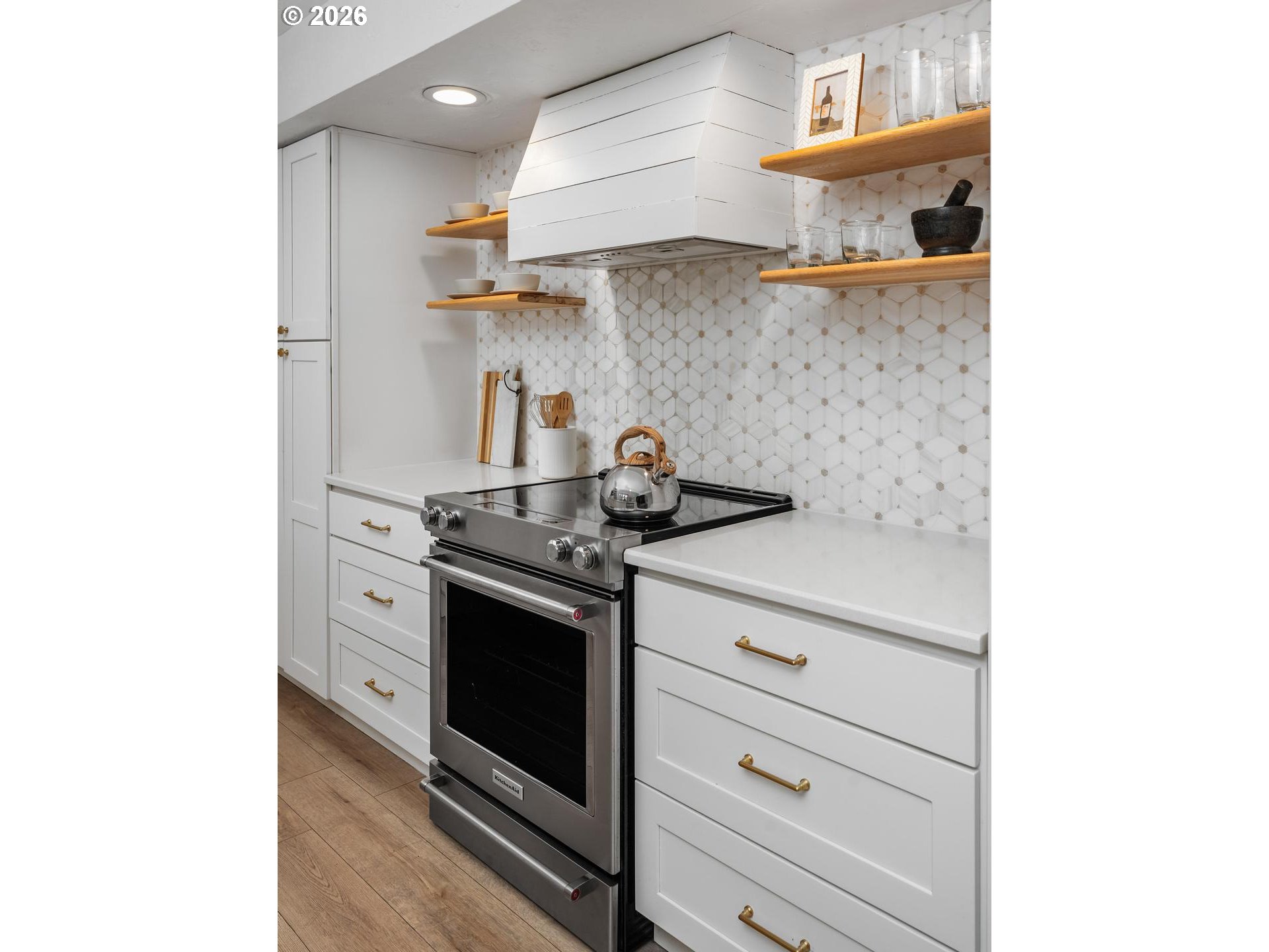 1641 Northwest 31st Avenue Camas, WA 98607 - Photo 13 of 39 a kitchen with stainless steel appliances granite countertop a sink and a stove