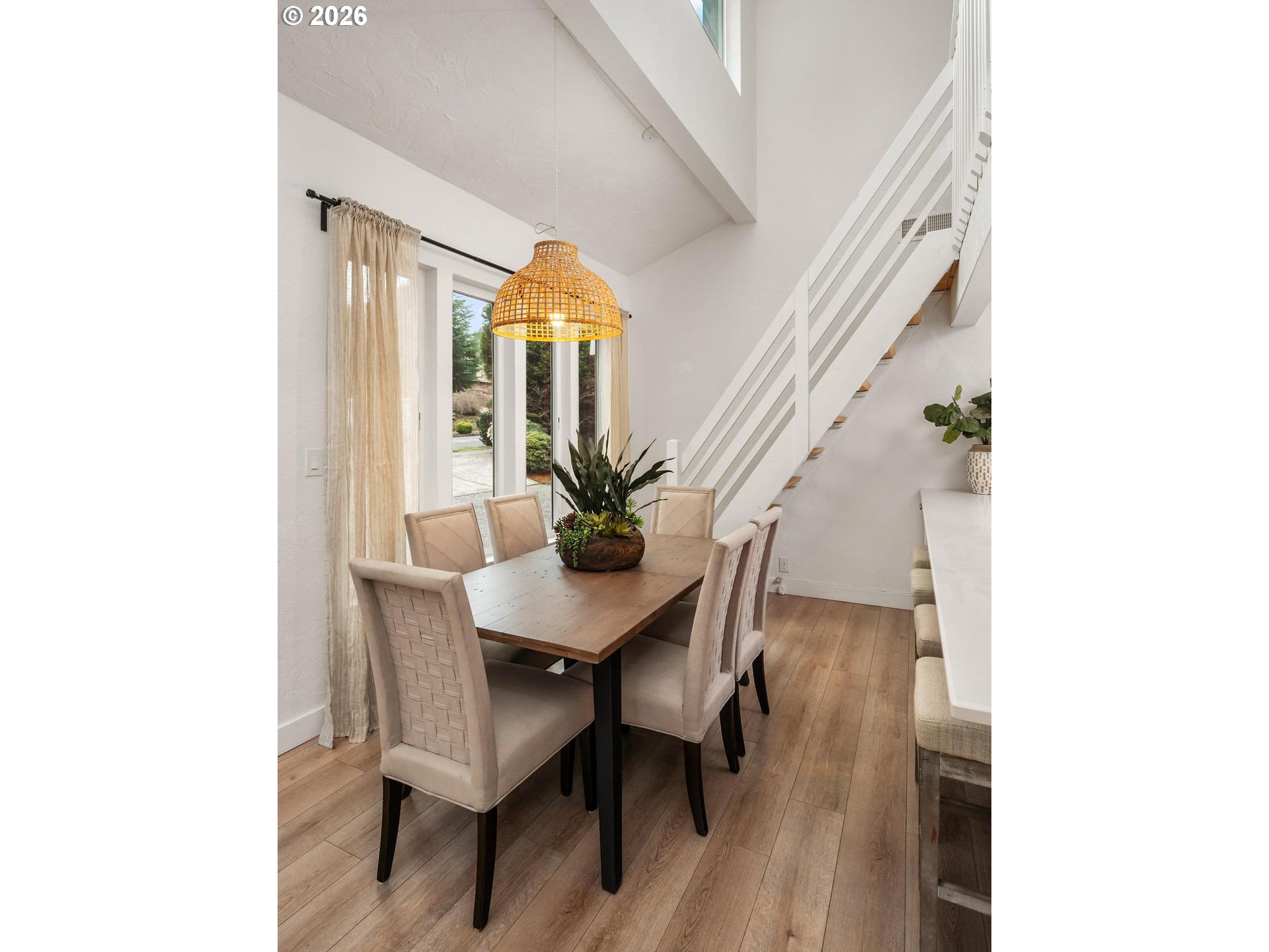 1641 Northwest 31st Avenue Camas, WA 98607 - Photo 17 of 39 a view of a dining room with furniture and wooden floor