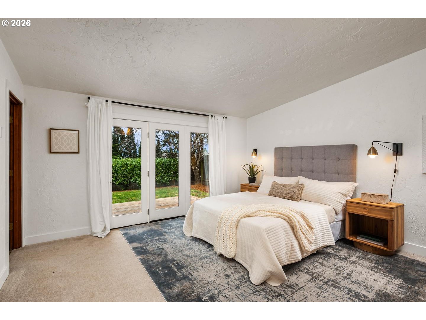 1641 Northwest 31st Avenue Camas, WA 98607 - Photo 18 of 39 a bedroom with a large bed and a large window