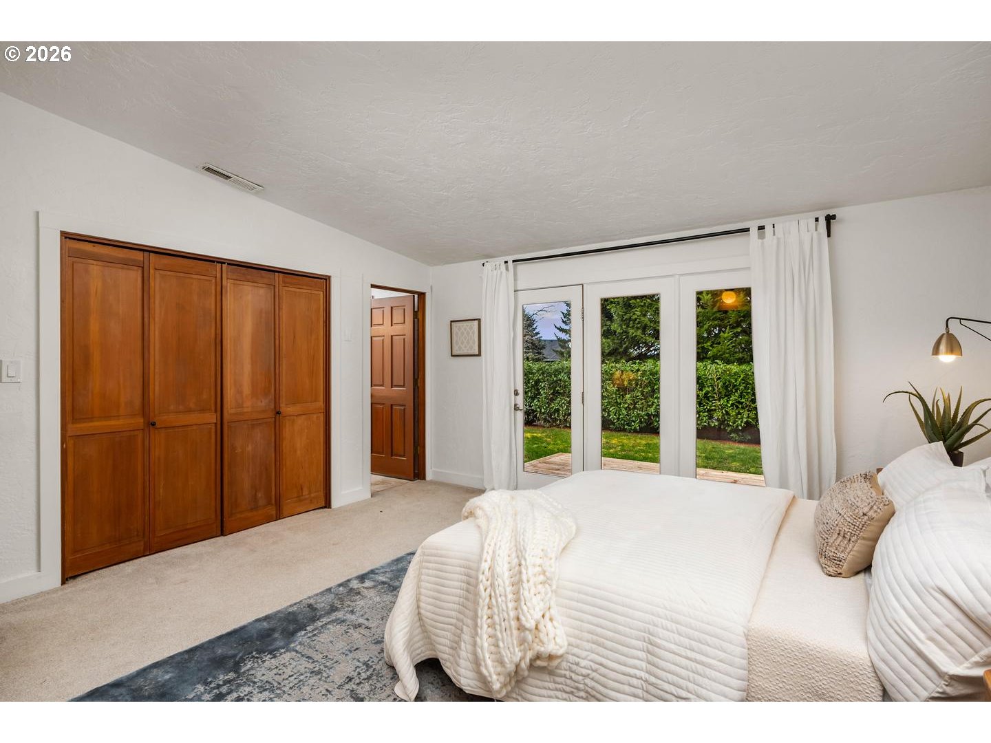 1641 Northwest 31st Avenue Camas, WA 98607 - Photo 20 of 39 a bedroom with a bed and a large window