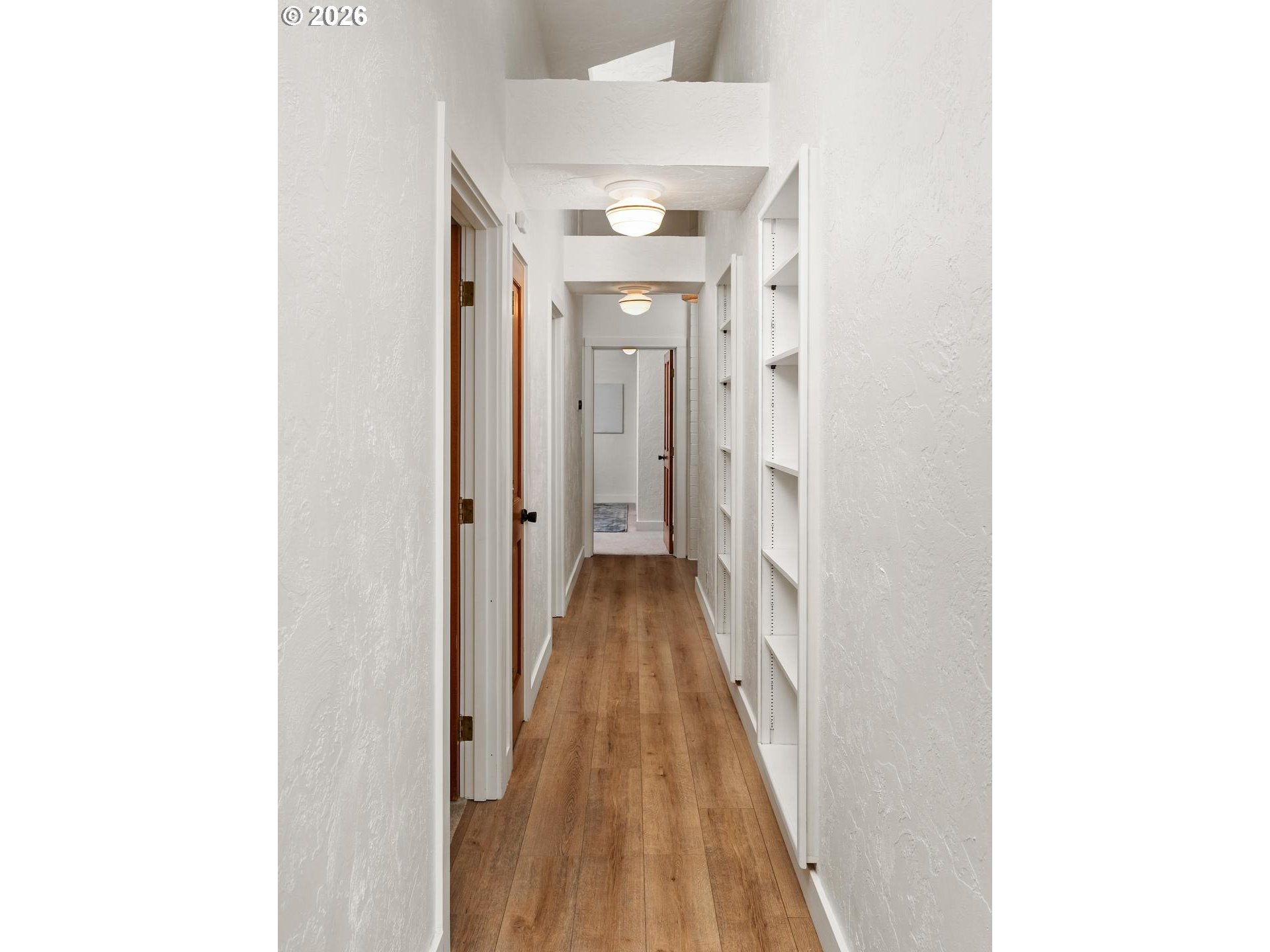 1641 Northwest 31st Avenue Camas, WA 98607 - Photo 24 of 39 a view of a hallway with wooden floor