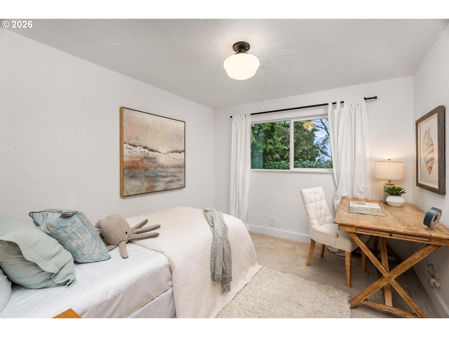 1641 Northwest 31st Avenue Camas, WA 98607 - Photo 25 of 39 a bedroom with a bed and a window