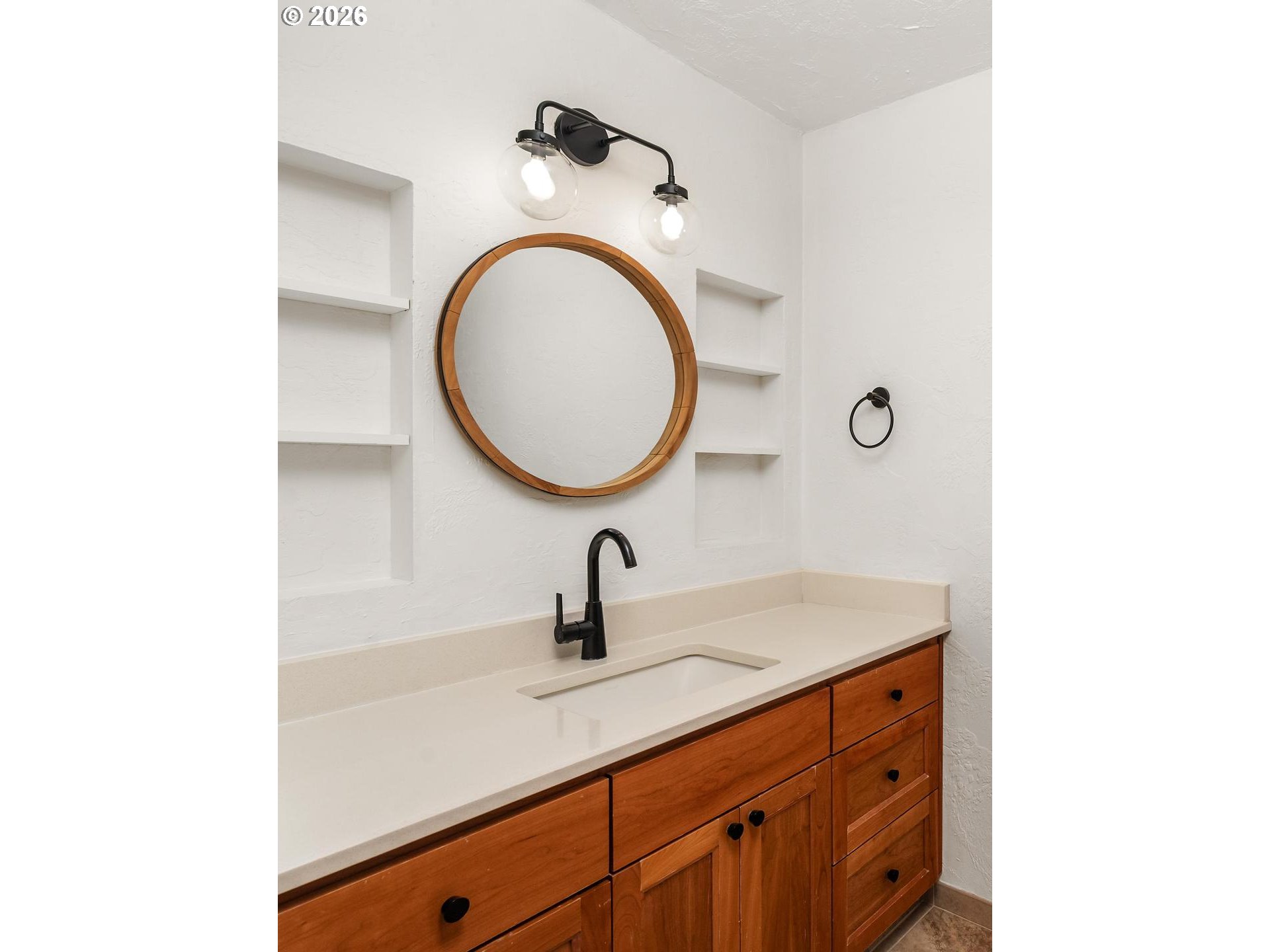 1641 Northwest 31st Avenue Camas, WA 98607 - Photo 27 of 39 a bathroom with a sink and a mirror