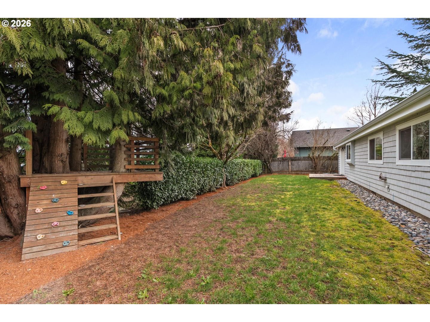 1641 Northwest 31st Avenue Camas, WA 98607 - Photo 34 of 39 a view of a backyard with a garden and entertaining space