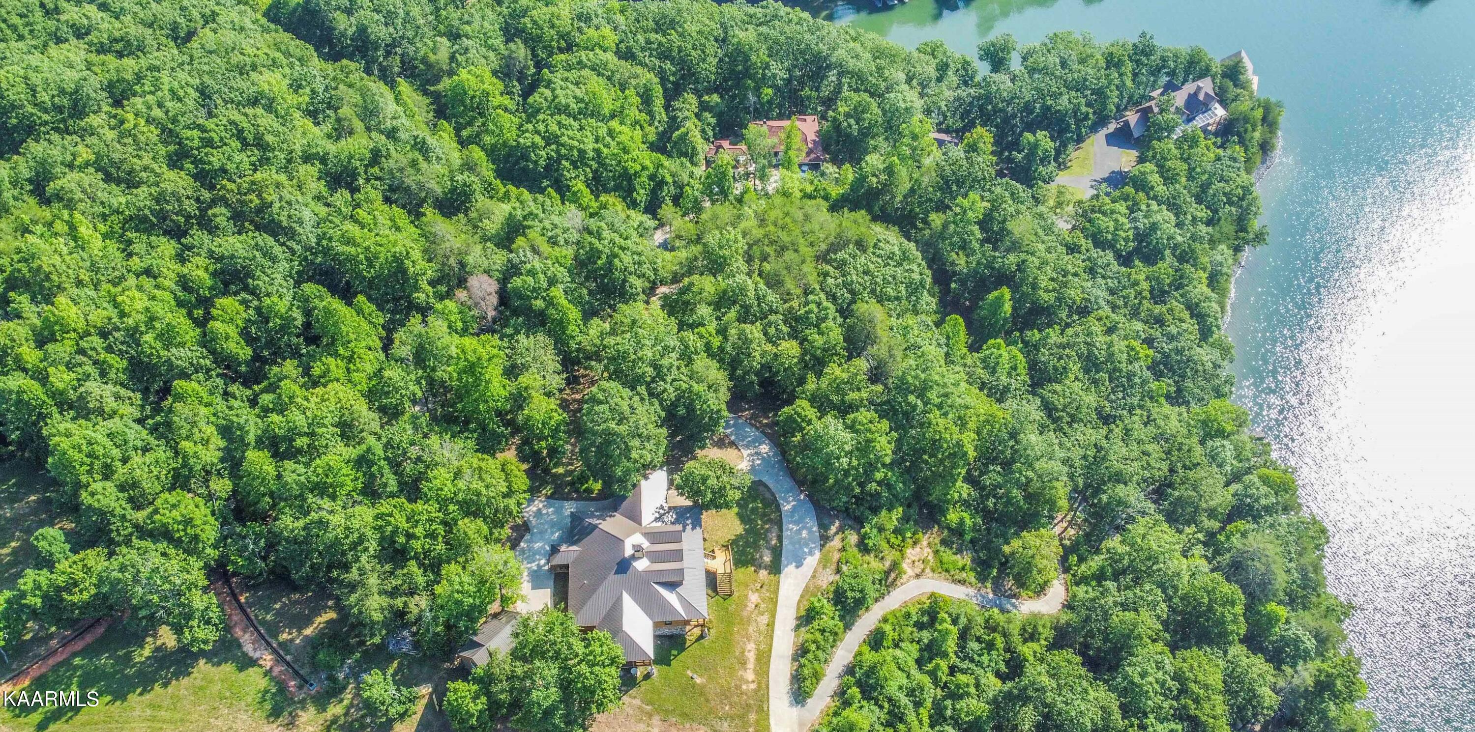 260 Lakeside Ridge Rd Spring Spring City, TN 37381 - Photo 51 of 58 House with path to lake