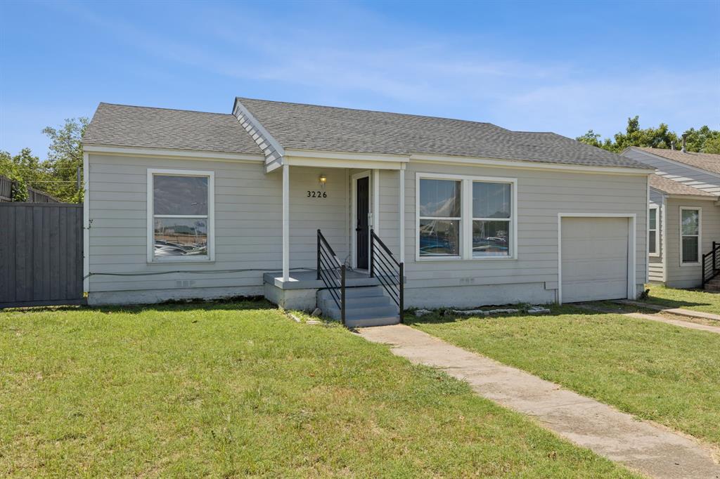 3226 Inwood Road Dallas, TX 75235 - Photo 4 of 25 a view of a house with a patio