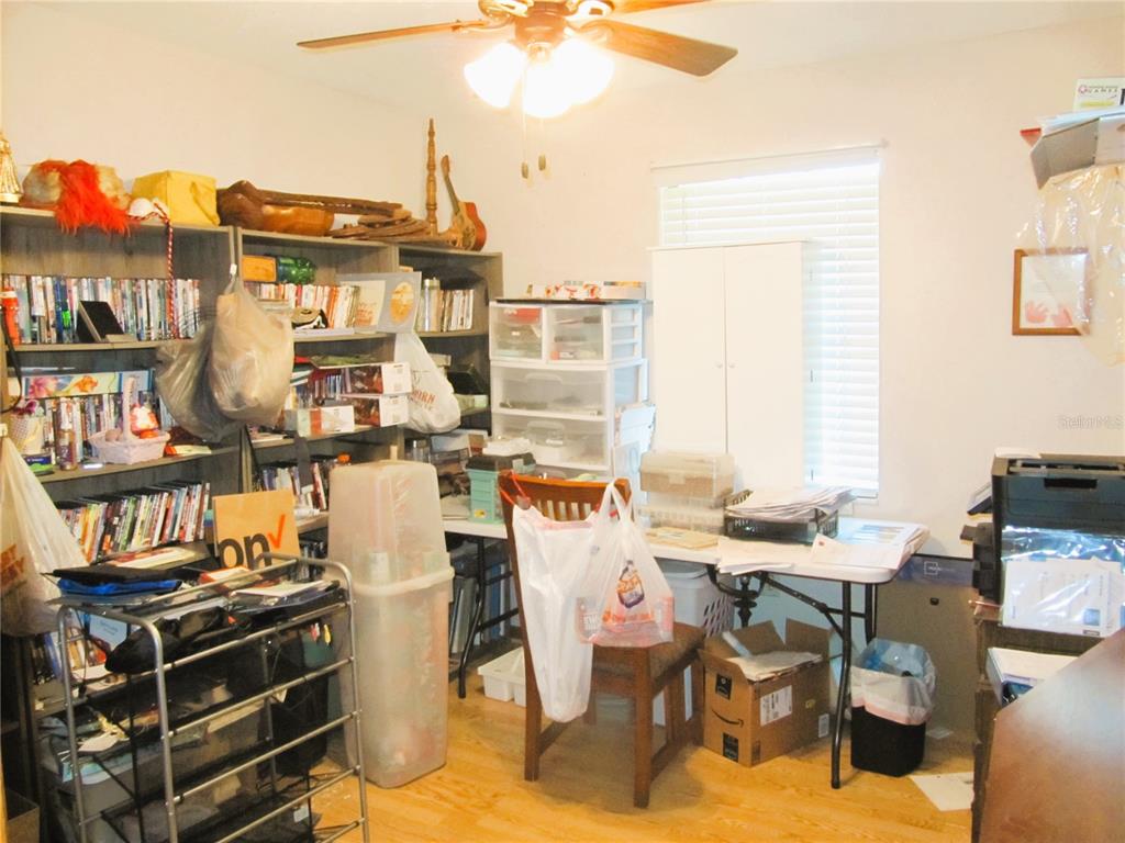 11815 Southeast 84 Avenue Belleview, FL 34420 - Photo 19 of 23 a view of a workspace with furniture