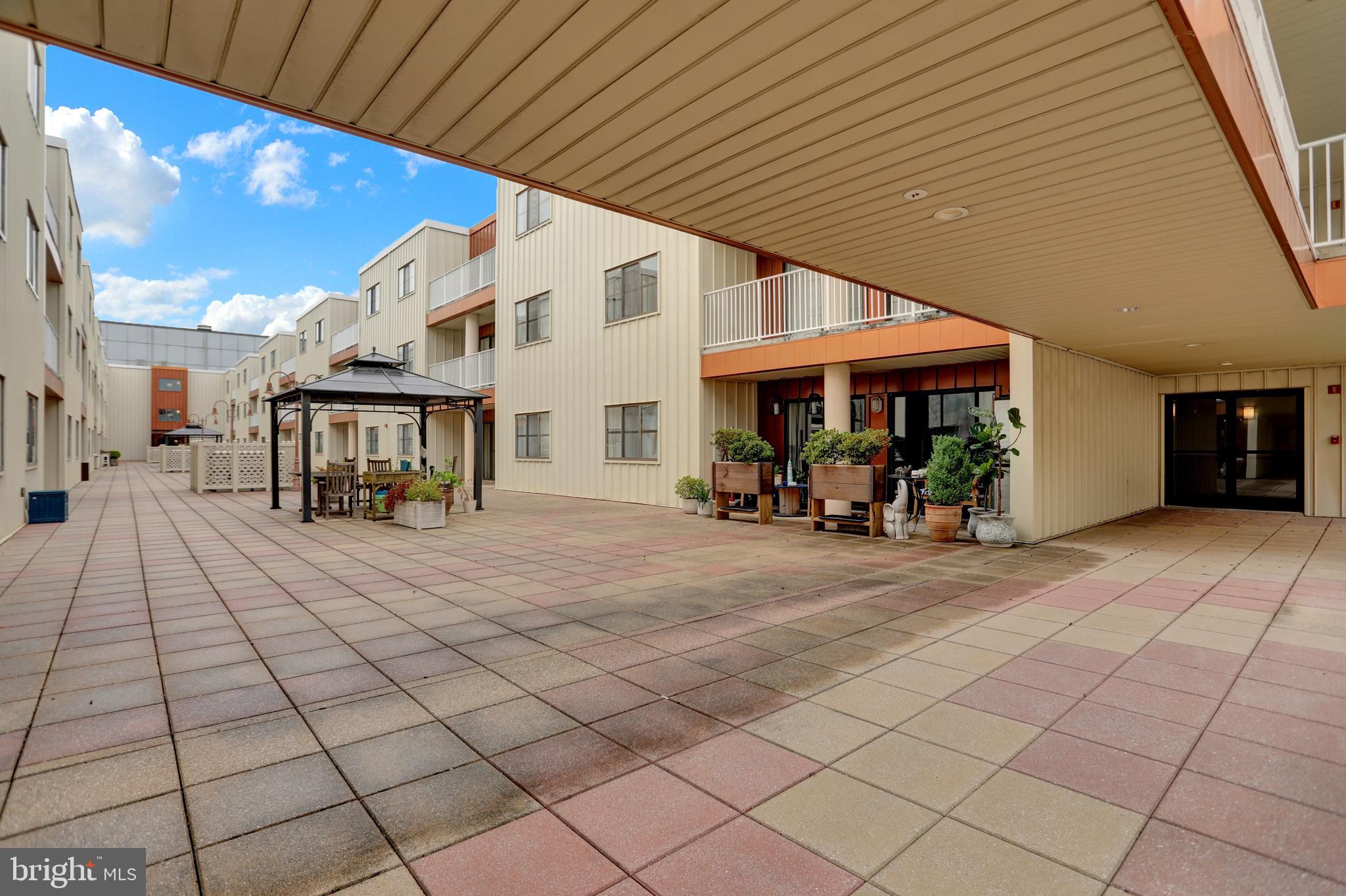 2702 Lighthouse Point East, Unit 532 Baltimore, MD 21224 - Photo 30 of 66 Courtyard