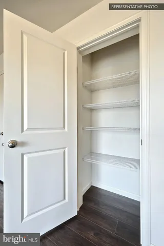 a view of a room with rack on the wall