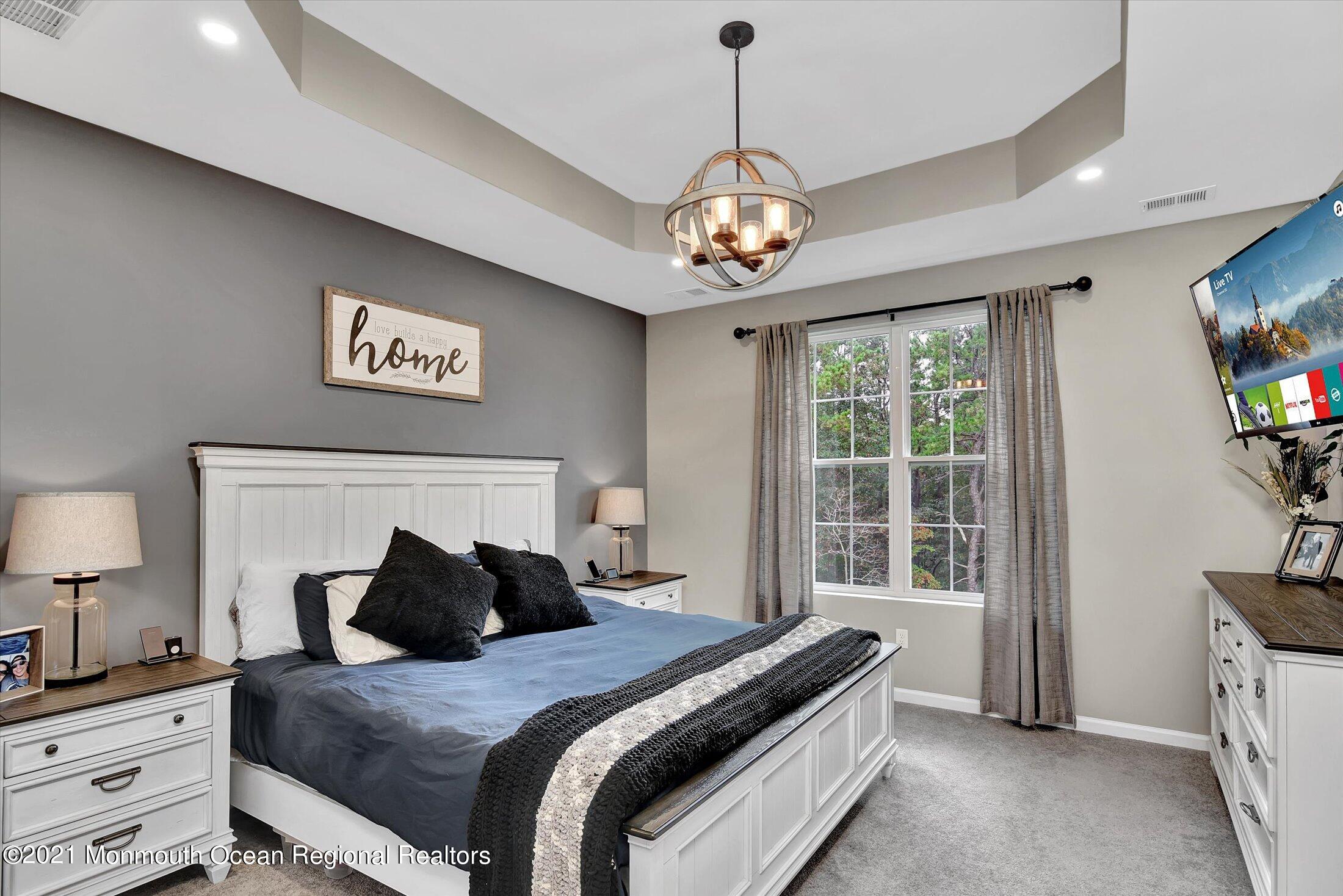 112 Revival Road, Unit 2012 Brick, NJ 08723 - Photo 15 of 22 a bedroom with bed and a window