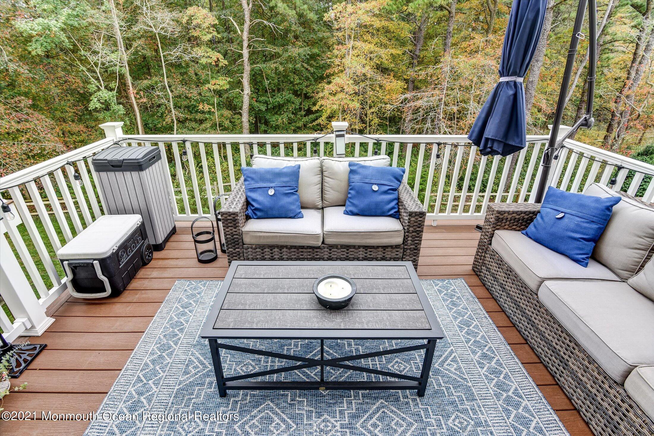 112 Revival Road, Unit 2012 Brick, NJ 08723 - Photo 5 of 22 a view of a chair and tables