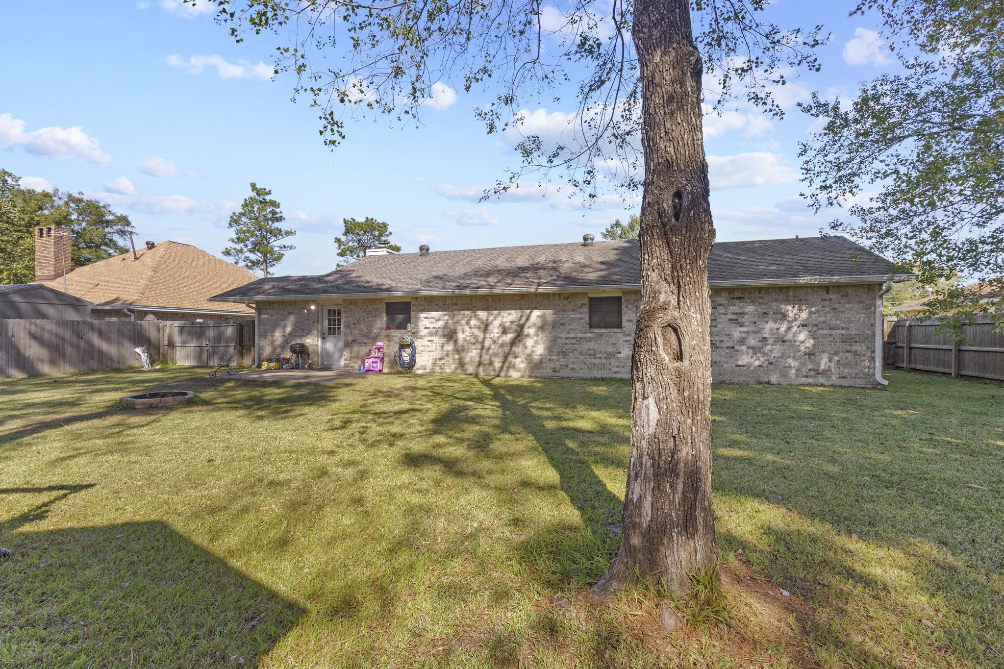 125 Williams Road Lumberton, TX 77657 - Photo 21 of 22 a swimming pool with some trees in the background