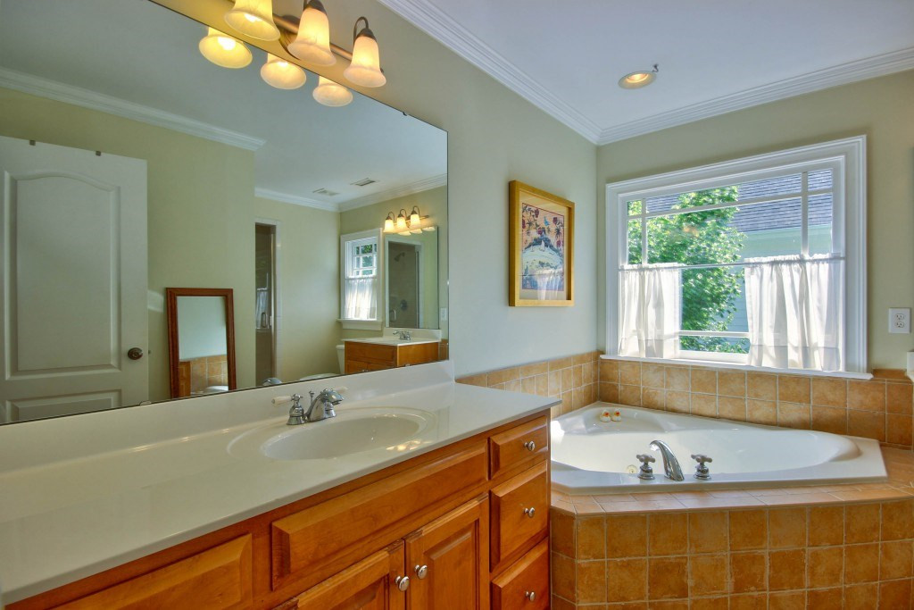 516 Pace Street Raleigh, NC 27604 - Photo 17 of 25 Separate sinks, shower and separate tub. The master bedroom also includes a spacious walk in closet . Master Bathroom