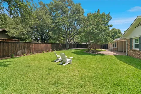 a view of a garden with a slide