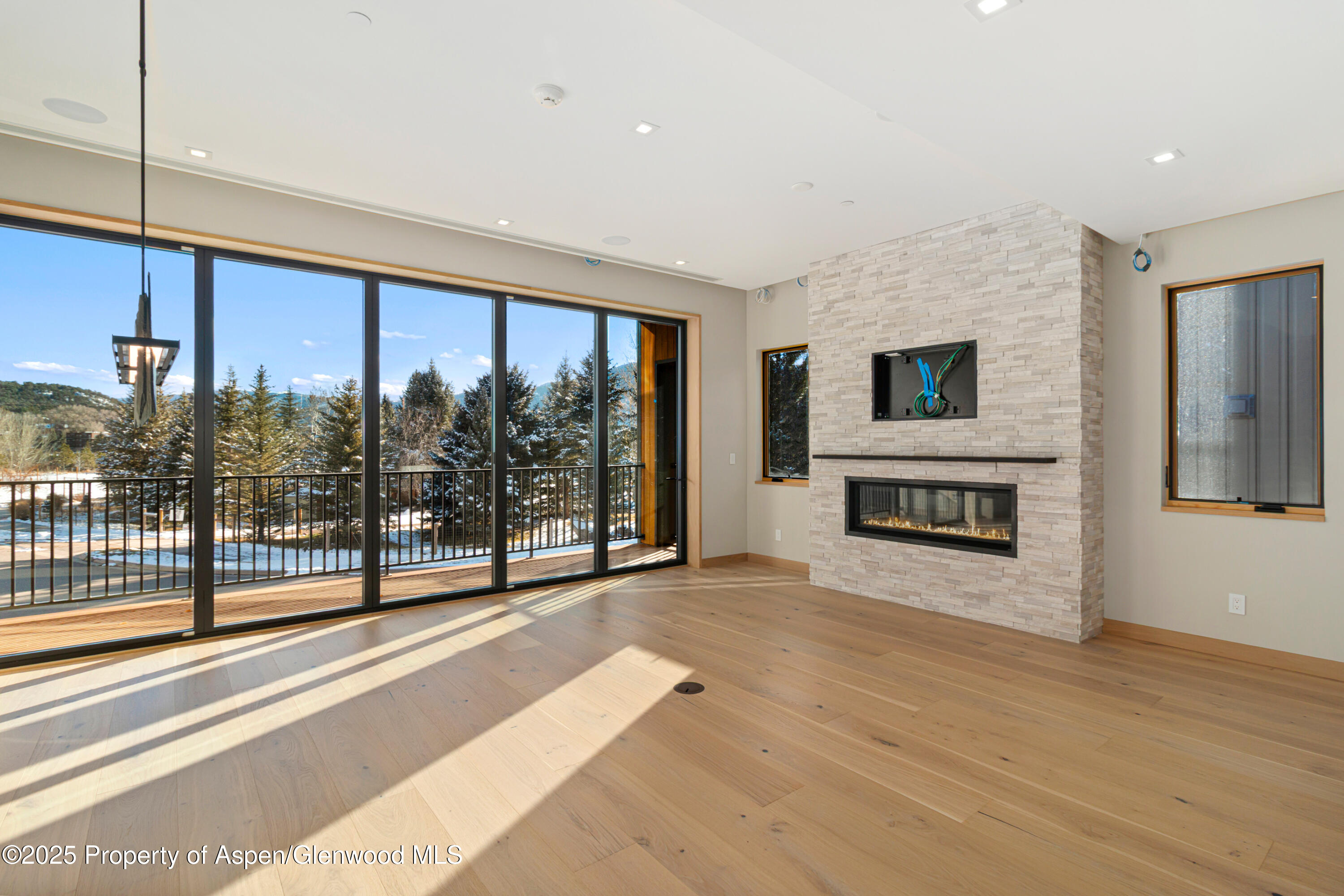 159 Lakeview Drive Basalt, CO 81621 - Photo 15 of 97 a view of an empty room with glass door
