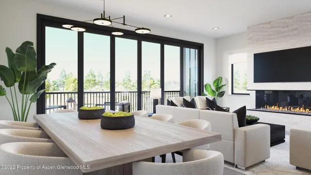 a living room with fireplace furniture and a flat screen tv
