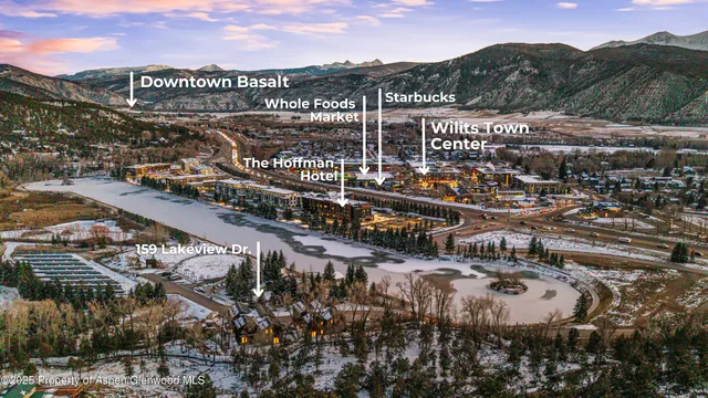 a view of an empty room with glass door