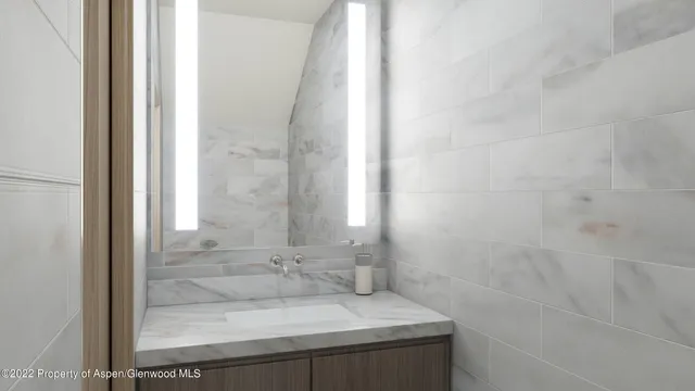 a bathroom with a sink and a shower