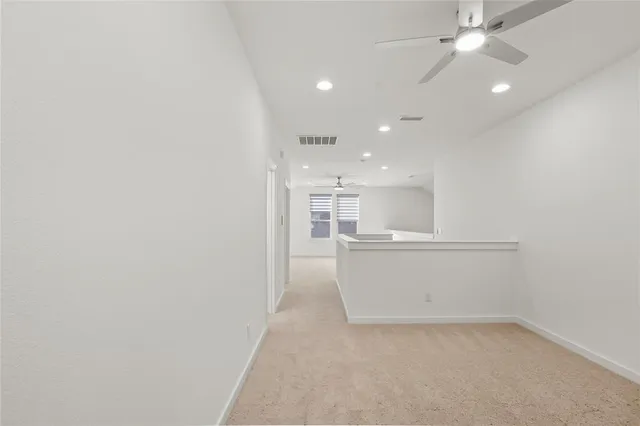 a view of a kitchen with a sink and cabinet