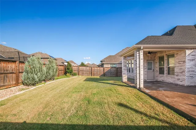 a view of a house with a swimming pool