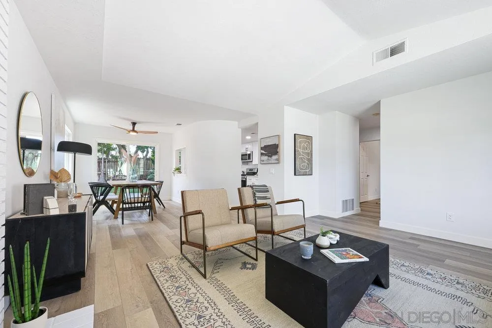 1636 Arabian Way Oceanside, CA 92057 - Photo 5 of 21 a living room with furniture and wooden floor