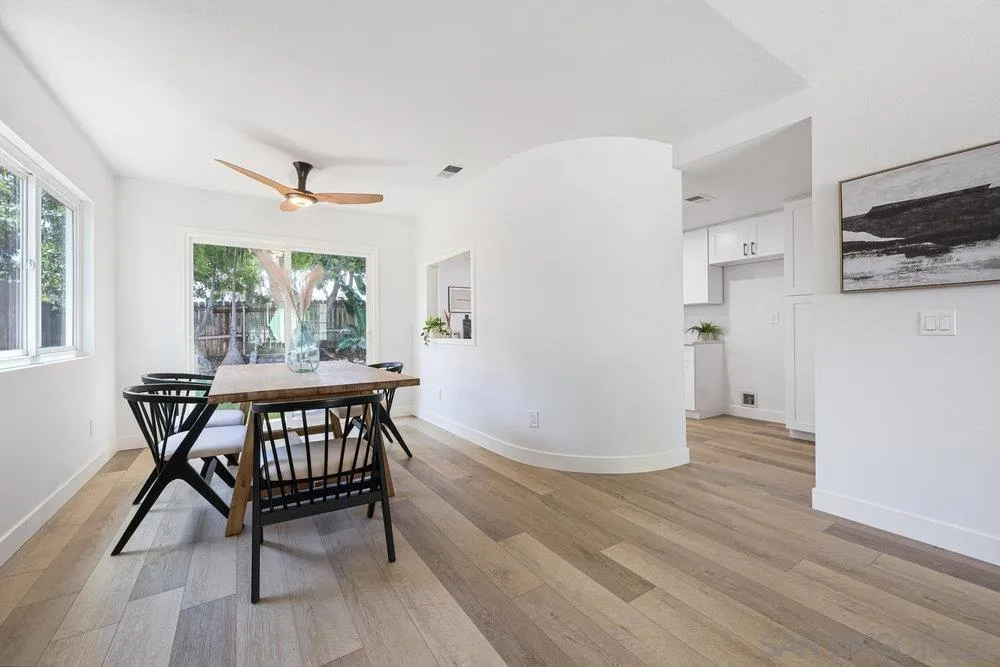 1636 Arabian Way Oceanside, CA 92057 - Photo 7 of 21 a view of a dining room with furniture window and wooden floor