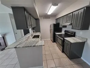 $470,000 | 12955 Woodforest Boulevard, Unit 53, Houston, TX 77015