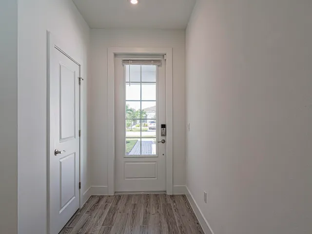 a view of a room that has a window in it