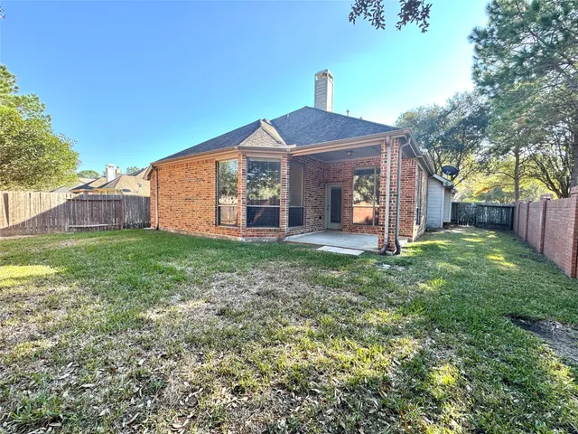 a picture of a bathroom with mirror