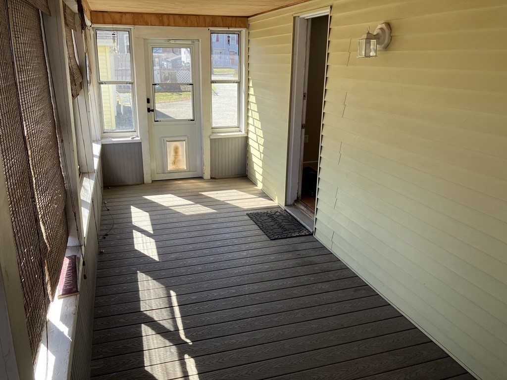 20 Cherry Street Hudson, MA 01749 - Photo 2 of 21 a view of a hallway with wooden floor and staircase