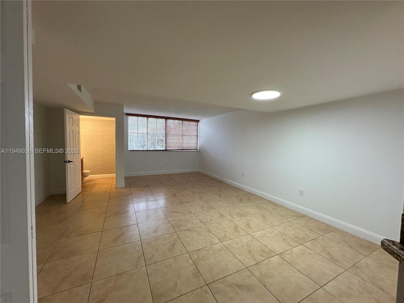 6045 Northwest 186th Street, Unit 320 Hialeah, FL 33015 - Photo 3 of 9