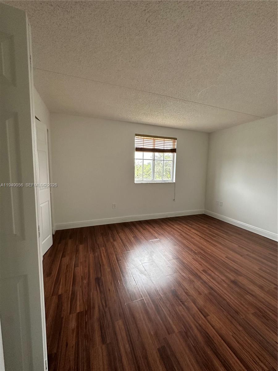 6045 Northwest 186th Street, Unit 320 Hialeah, FL 33015 - Photo 6 of 9