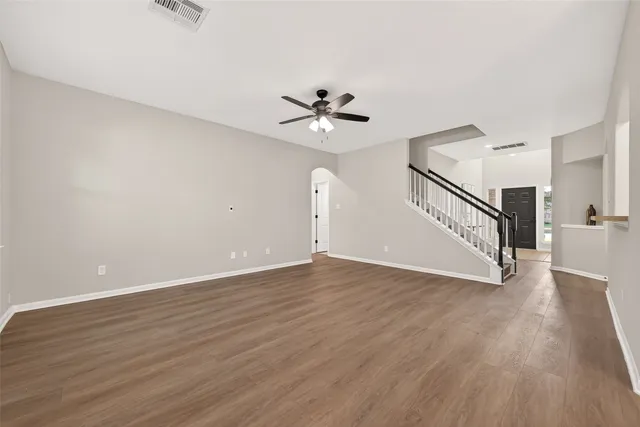 a kitchen with stainless steel appliances granite countertop a stove and a microwave