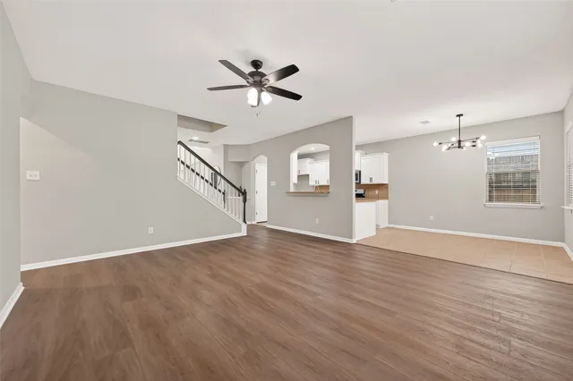 a kitchen with a sink a stove and a refrigerator