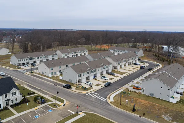 an aerial view of a residential building