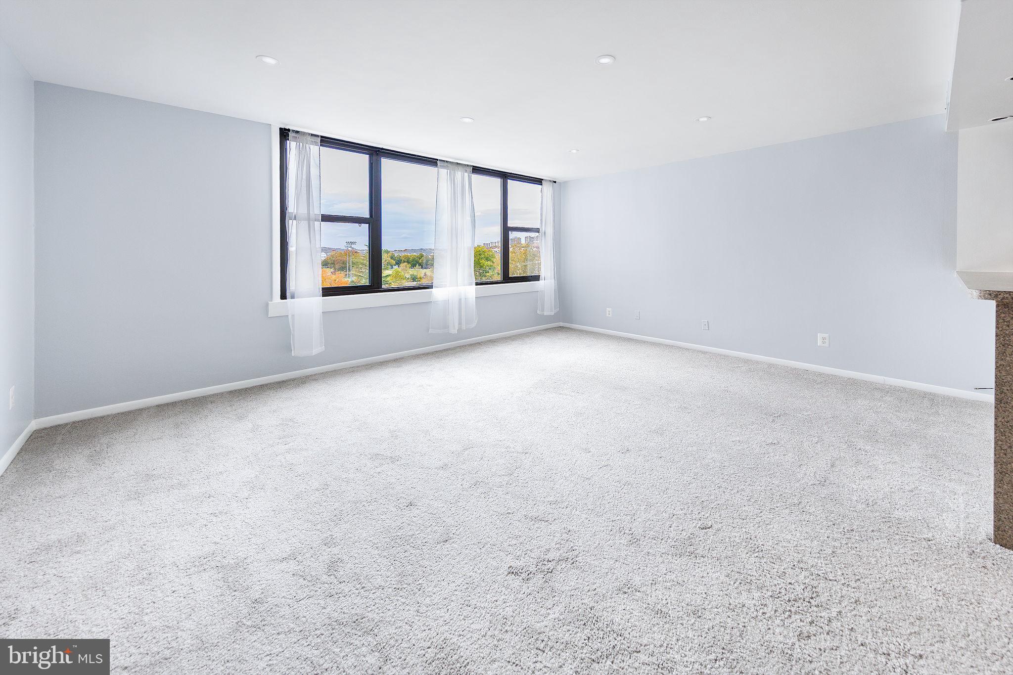 4600 Duke Street, Unit 622 Alexandria, VA 22304 - Photo 12 of 52 a view of an empty room with a window