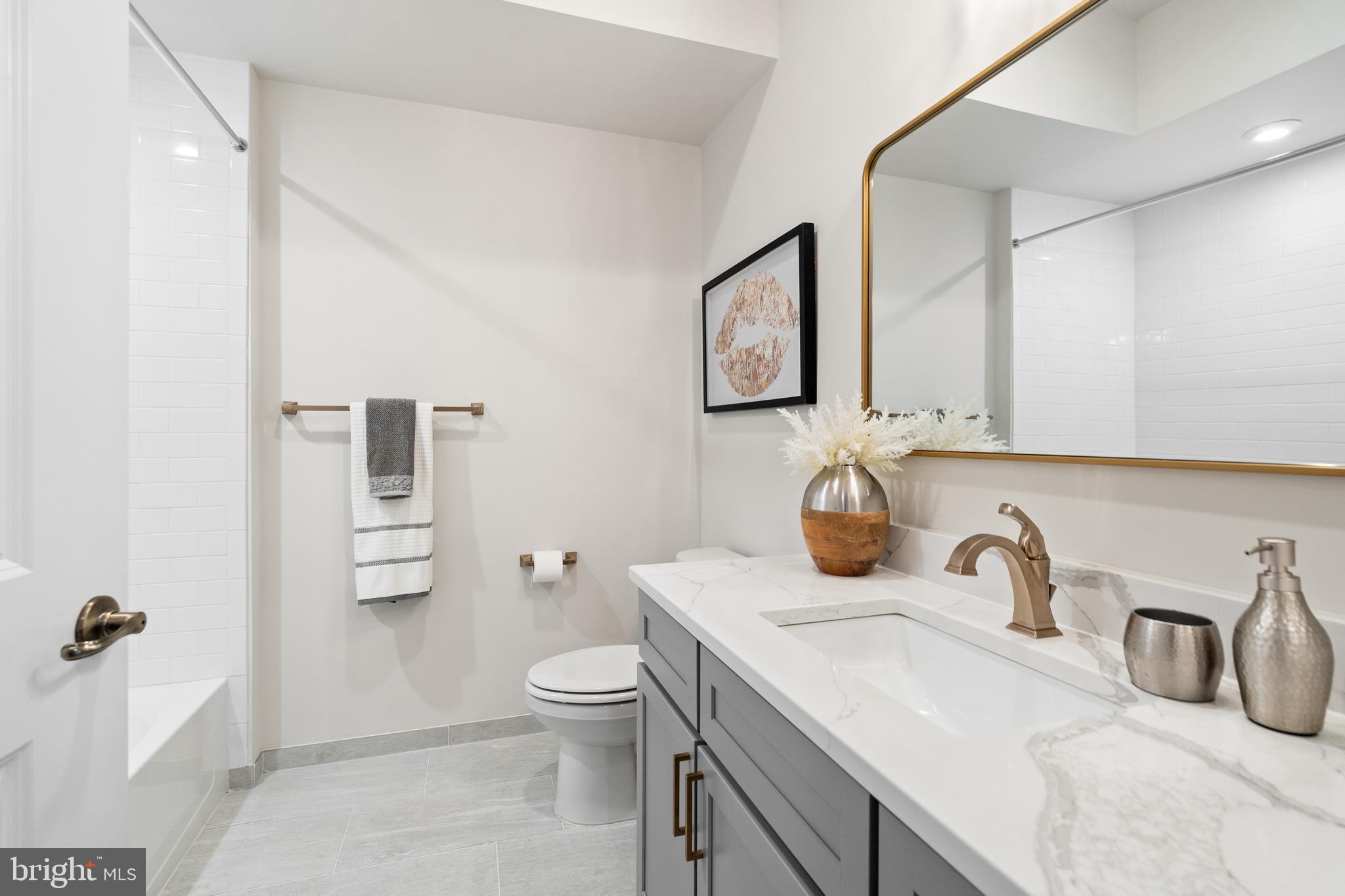 8513 Reformatory Way Lorton, VA 22079 - Photo 26 of 46 Gold, brushed finishes throughout