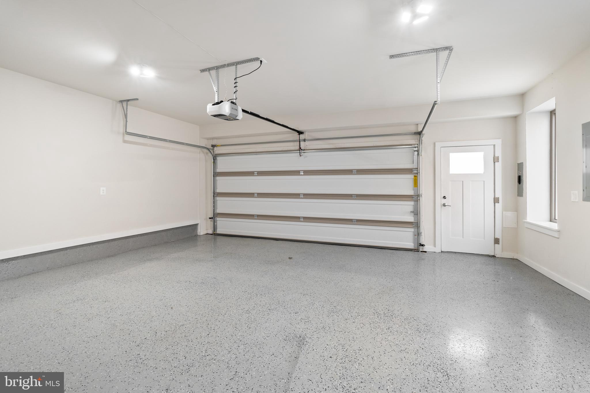 8513 Reformatory Way Lorton, VA 22079 - Photo 34 of 46 Epoxy flooring in garage