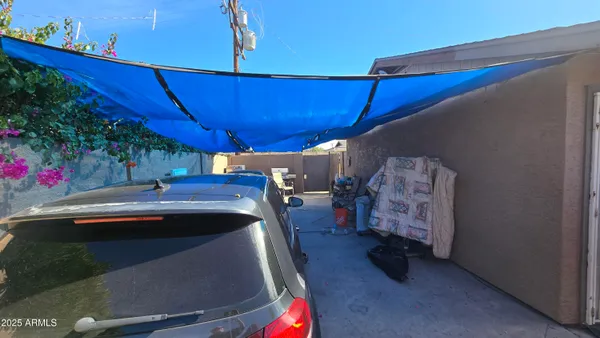 a view of yard with patio