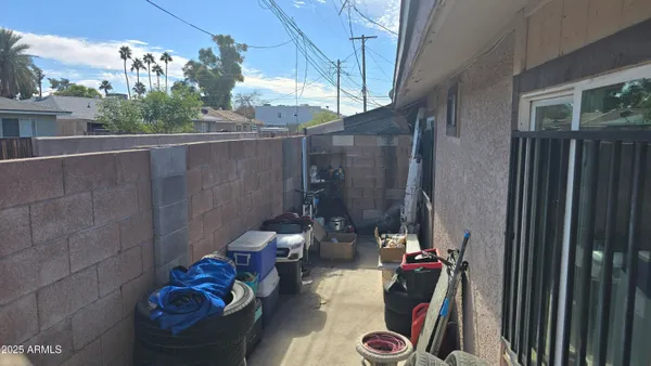 a bedroom with a bed and a table