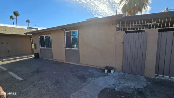 a view of street from balcony