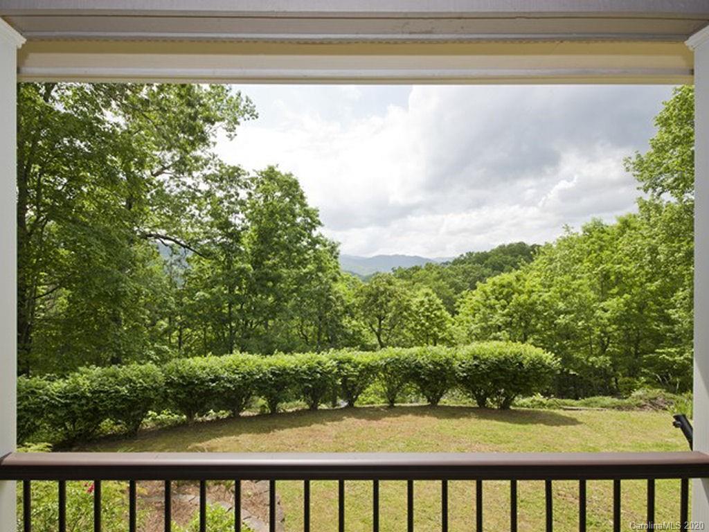 82 Gregg Roost Road Sylva, NC 28779 - Photo 12 of 35 a front view of a house with a yard