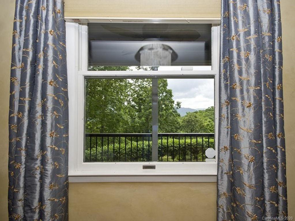 82 Gregg Roost Road Sylva, NC 28779 - Photo 25 of 35 a window that has a window