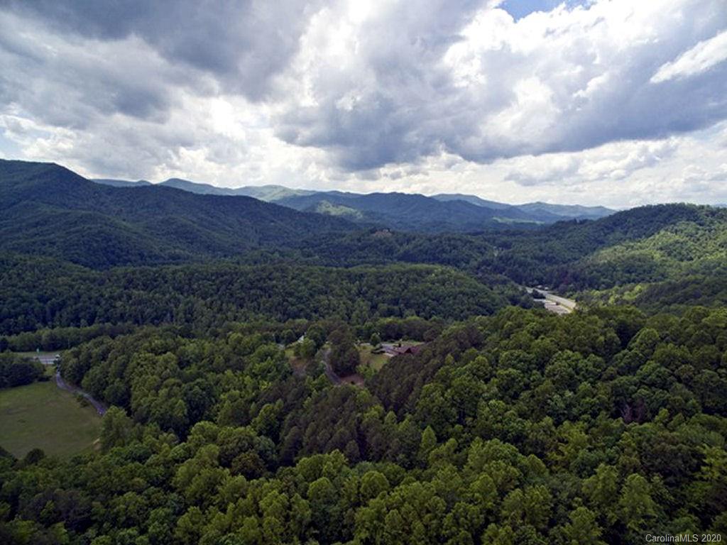 82 Gregg Roost Road Sylva, NC 28779 - Photo 6 of 35 an aerial view of houses covered in trees