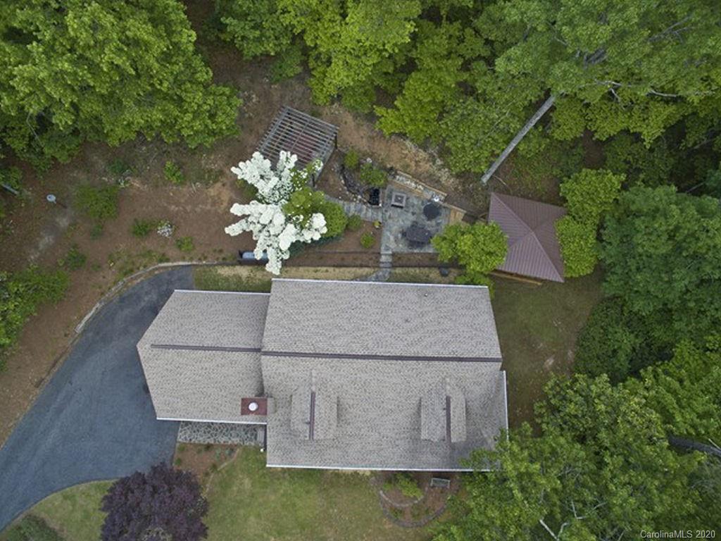 82 Gregg Roost Road Sylva, NC 28779 - Photo 8 of 35 a view of a house with a yard