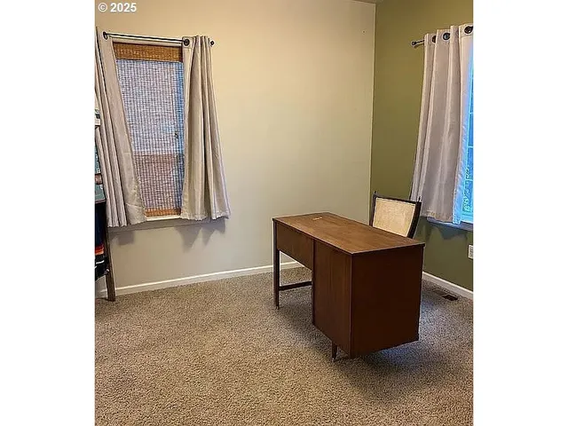 a room with a table and a chair