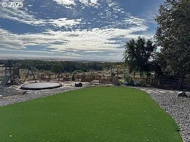 a view of a lake with a garden