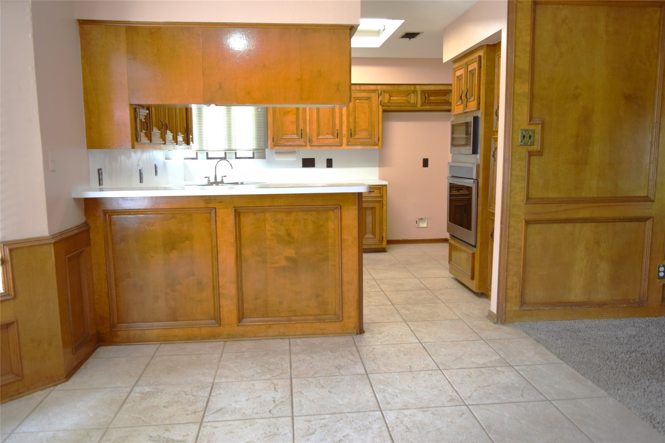 7331 Rancho Mission Drive Houston, TX 77083 - Photo 6 of 20 From breakfast area to the kitchen