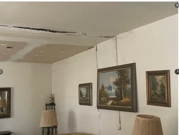 a picture of a bathroom with a shower