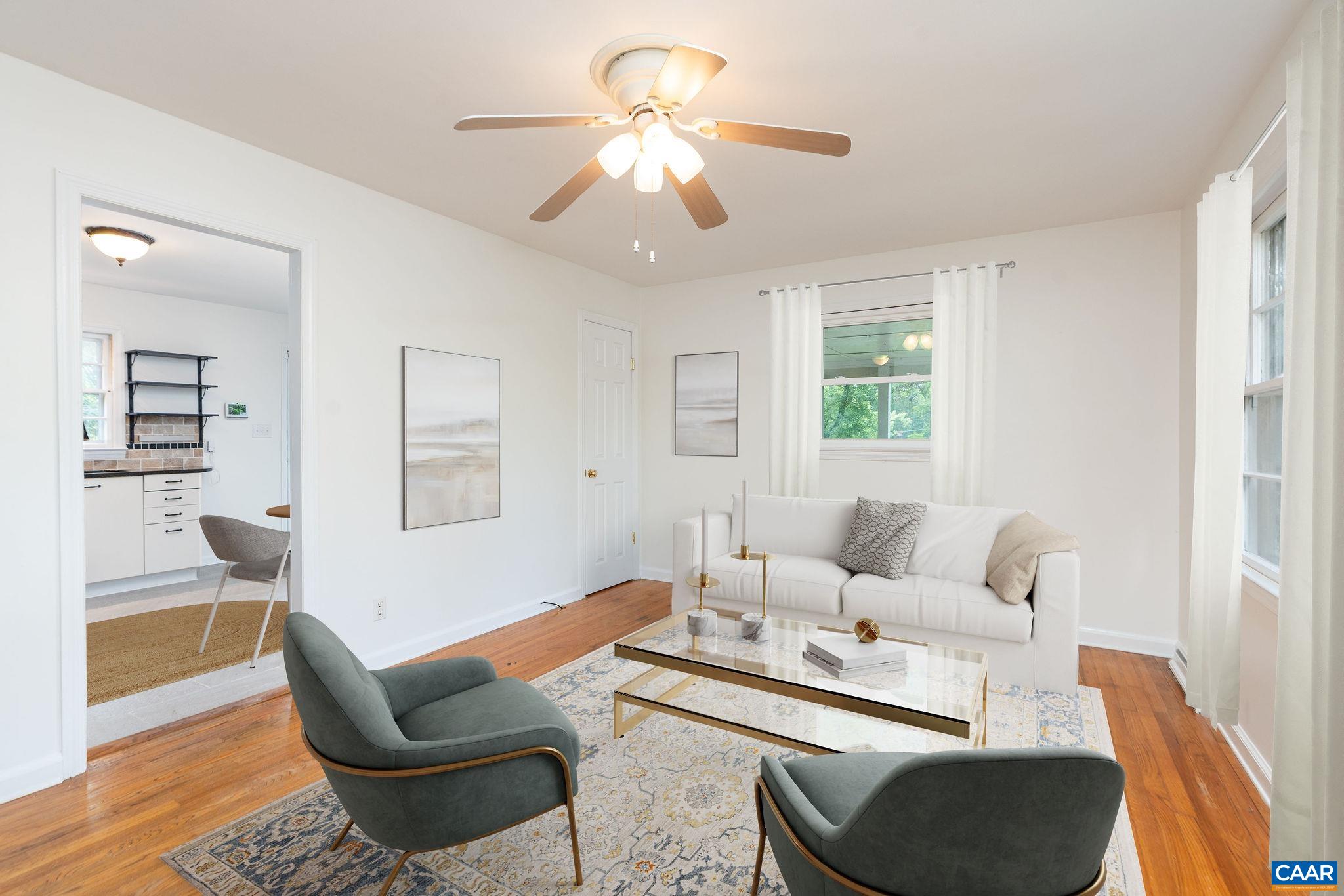 122 Westerly Avenue, Unit WHOLE HOUSE Charlottesville, VA 22903 - Photo 4 of 16 a living room with furniture and a table